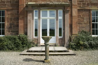 Exterior. Detail of garden door and fountain.