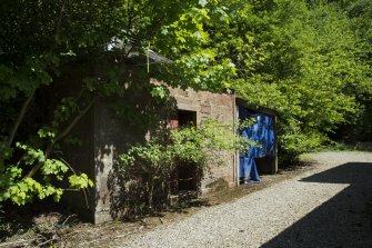 Exterior. General view of outbuildings to north of courtyard area.