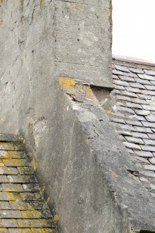 Detail of notch at base of chimney at north end of original block of south east range