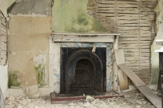 South east range, first floor, north room, detail of fireplace