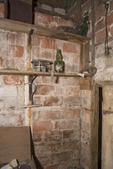 South east range, ground floor, under stair cupboard, detail of brickwork