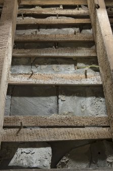 North west range, attic space above central room, detail of slates with wooden pegs