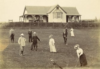 View of golfers at Brora golf course.