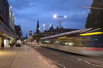 View from west with blurred tram in foreground