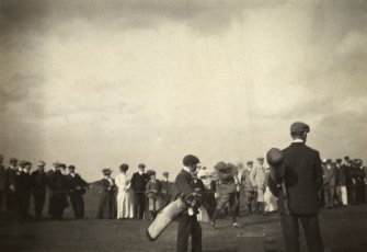 View of golfers at the Old Course in St Andrews.