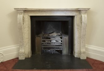 1st floor. Corridor. Detail of fireplace.