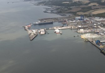 Oblique aerial view of Rosyth Dockyard, looking W.