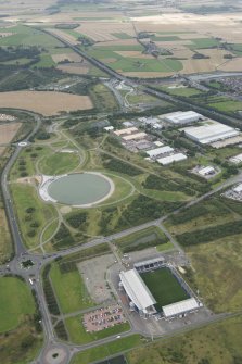 Oblique aerial view of The Helix Public Park and Falkirk Stadium, looking N.