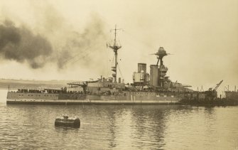 British battleship HMS Valiant leaving dock
