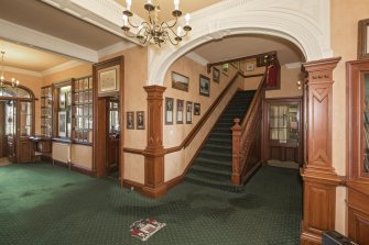 Ground floor. Hall and staircase from north west.