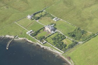 Oblique aerial view of Gardie House, Bressay, looking N.