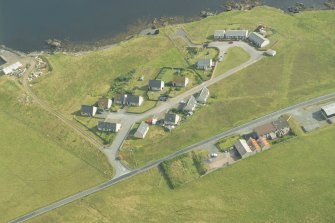 Oblique aerial view of Stucca, Hillswick, looking SSE.