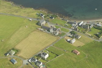 Oblique aerial view of Hillswick, looking SE.