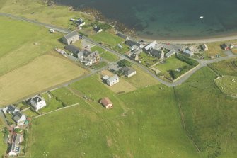 Oblique aerial view of Hillswick, looking SE.