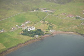 General oblique aerial view of Busta House, looking NW.