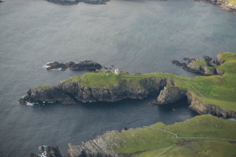 Oblique aerial view of Mucklaberry Tower, Vaila, looking NW.