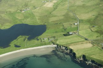 General oblique aerial view of Fetlar Kirk, The Glebe, looking NNW.