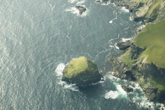 Oblique aerial view of Busta Pund, Fetlar, looking SE.