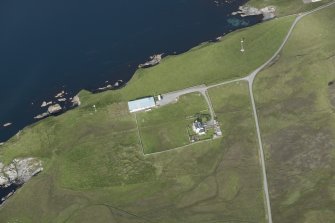 Oblique aerial view of St Rognvald's, Aith, Fetlar, looking NW.