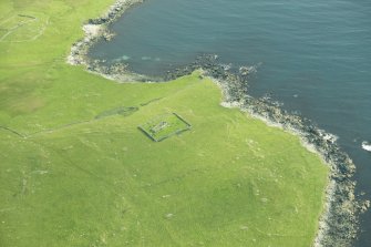 Oblique aerial view of Framgord Chapel, Sandwick, looking NW.