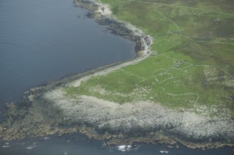 Oblique aerial view of Clugan, Unst, looking NW.