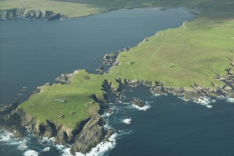 Oblique aerial view of Horns of The Garths, Skaw, Unst, looking W.