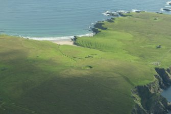 Oblique aerial view of Inner Skaw, Unst, looking NE.