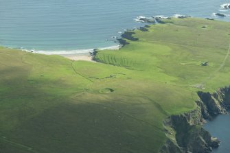 Oblique aerial view of Inner Skaw, Unst, looking NE.