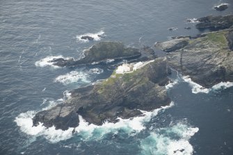 Oblique aerial view of North Unst Lighthouse, Muckle Flugga, looking SSE.