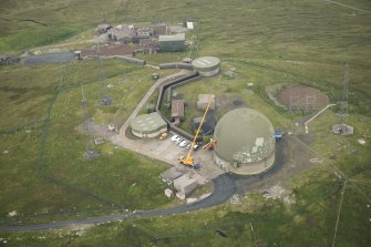 Oblique aerial view of Saxa Vord, Unst, looking W.
