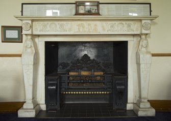 1st floor. Members bar. Detail of fireplace.