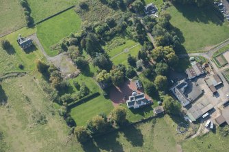 Oblique aerial view of Kilmaronock Castle and Kilmaronock House, looking SSW.