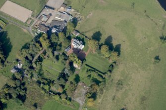 Oblique aerial view of Kilmaronock Castle and Kilmaronock House, looking NW.