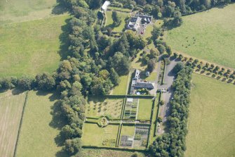 Oblique aerial view of Geilston House, looking SE.