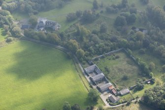 Oblique aerial view of Darleith Castle and walled garden, looking SE.