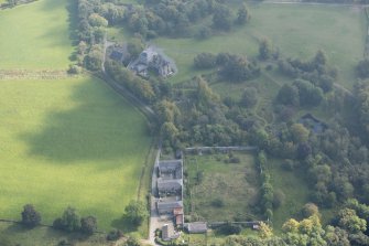 Oblique aerial view of Darleith Castle and walled garden, looking E.