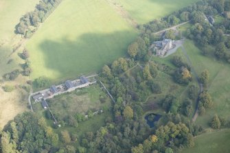 Oblique aerial view of Darleith Castle and walled garden, looking NNE.