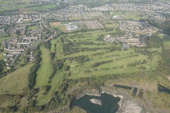 Oblique aerial view of Cochrane Castle Golf Course, looking NW.