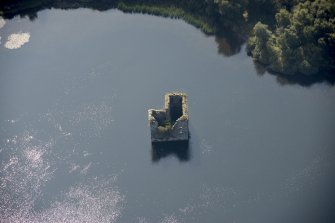 Oblique aerial view of Stanely Castle, looking SSW.