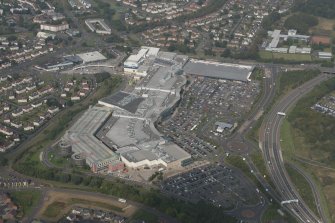 Oblique aerial view of Silverburn Sopping Centre, looking N.