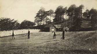 View of golfers at Oban golf course.
