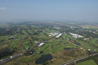 General oblique aerial view of The PGA Golf Course, looking N.