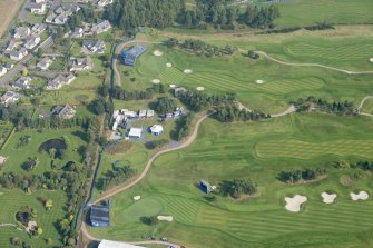 Oblique aerial view of the 12th  and 14th holes of The PGA Golf Course, looking SW.