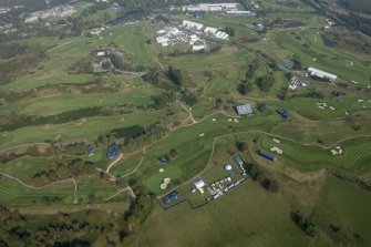 Oblique aerial view of the 3rd and 7th hole of The PGA Golf Course, looking NNW.