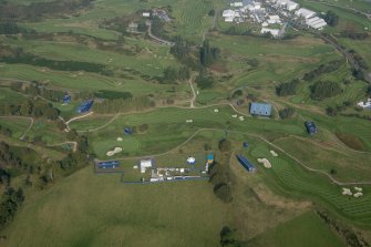 Oblique aerial view of the 3rd and 7th hole of The PGA Golf Course, looking N.