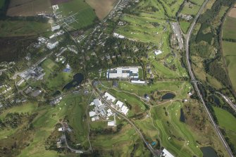 Oblique aerial view of the 2014 Ryder Cup PGA Centenary Golf Course, looking NE.