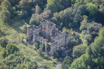 Oblique aerial view of Lennox Castle, looking SSW.