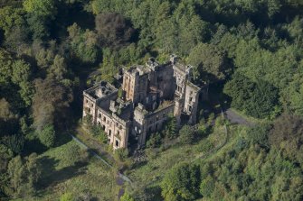 Oblique aerial view of Lennox Castle, looking WNW.