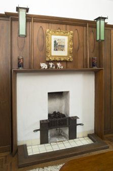 Ground floor, dining room, view of fireplace on south wall