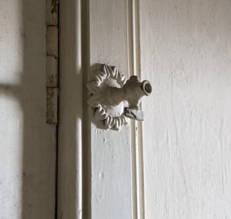 Interior. Detail of gas light fitting within Caretaker's flat